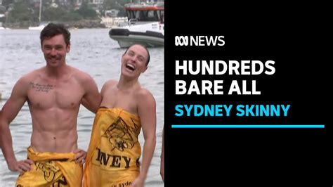 naked swimming|Hundreds shed their clothes for Sydney's annual nude swim.